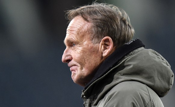 Dortmund's CEO Hans-Joachim Watzke looks skeptical prior the German Bundesliga soccer match between Borussia Moenchengladbach and Borussia Dortmund in Moenchengladbach, Germany, Friday, Jan. 22, ...