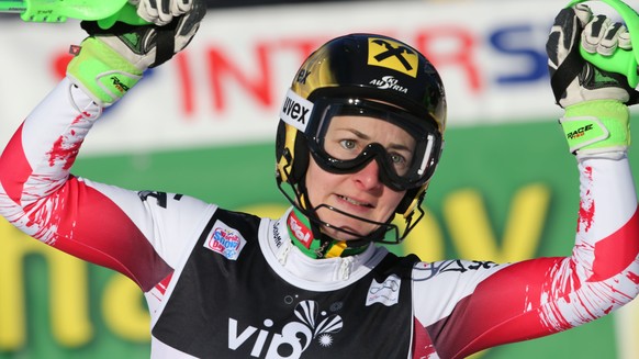 Kathrin Zettel of Austria celebrates in the finish area after taking second place in an alpine ski, women's World Cup slalom in Sljeme, Zagreb, Croatia, Sunday, Jan. 4, 2015. (AP Photo/Giovanni A ...