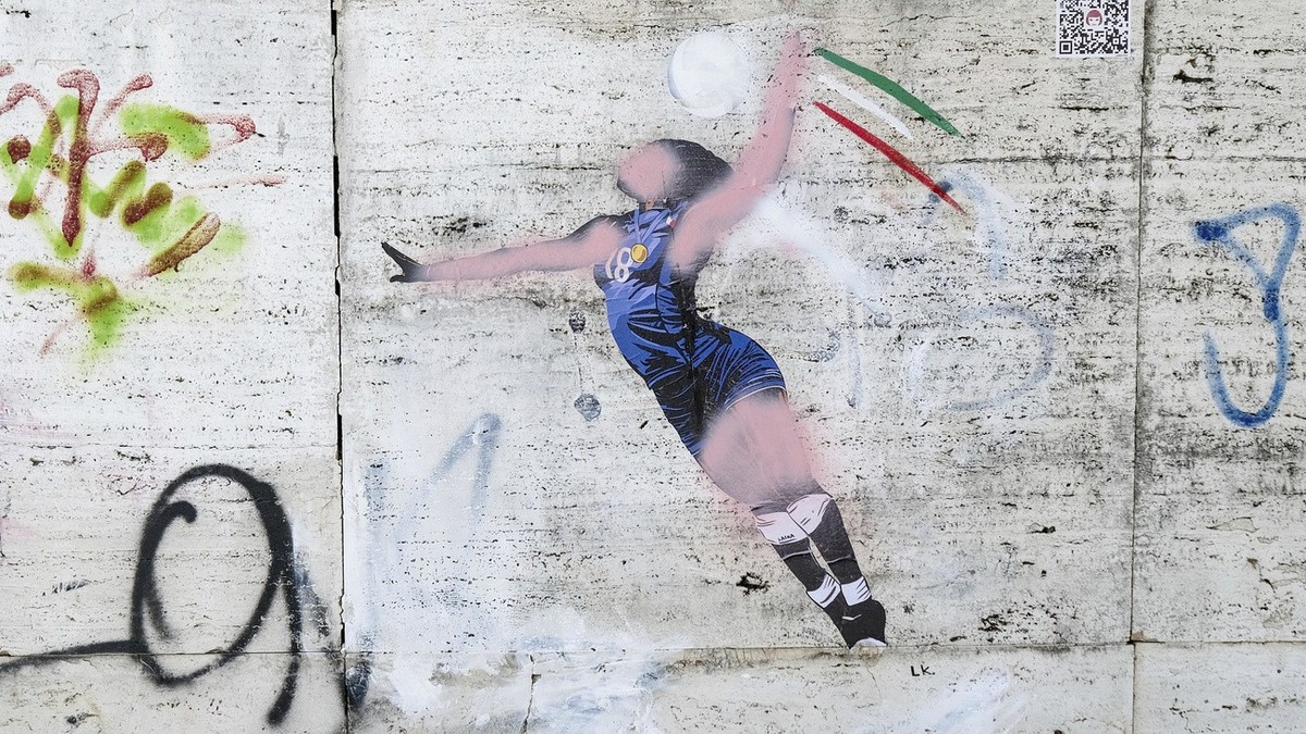 A view of a mural in homage to the Italian volleyball player Paola Egonu after being vandalized, on a wall, in front of the CONI headquarters in Viale Tiziano in Rome, Tuesday, Aug. 13 2024. (Mauro Sc ...