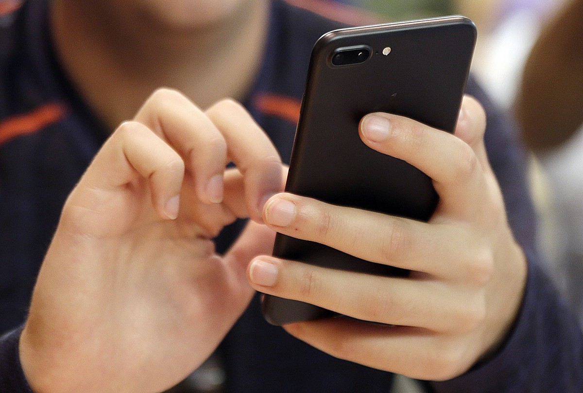 FILE - A person uses a smartphone in Chicago, Sept. 16, 2017. (AP Photo, File)
Tea App Breach