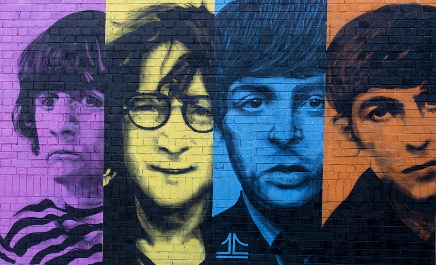 epa08743611 A mural of the Beatles is painted onto a wall in the Baltic Triangle area Liverpool, Britain, 14 October 2020. EPA/PETER POWELL