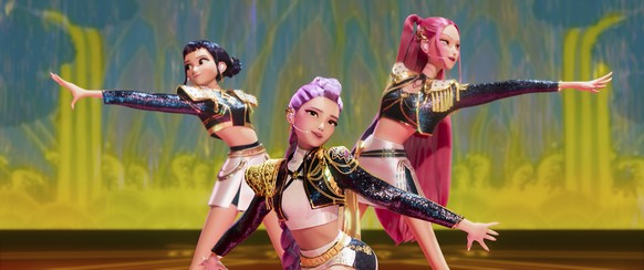 This image released by Netflix shows characters Zoey, from left, Rumi and Mira in a scene from &quot;KPop Demon Hunters.&quot; (Netflix via AP)
KPop Demon Hunters