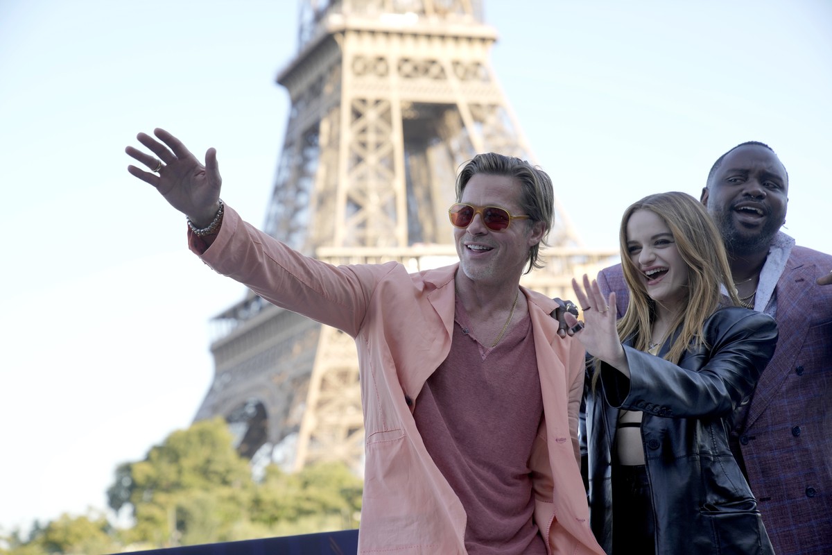 Actor Brad Pitt, left, Actress Joey King, Actor Brian Tyree Henry pose during a photo call for the film 'Bullet Train' in Paris, France, Saturday, July 16, 2022. (AP Photo/Christophe Ena)