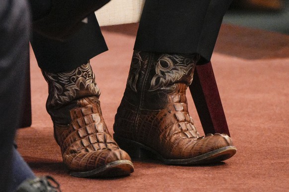 A view of the boots worn by Republican presidential candidate Florida Gov. Ron DeSantis as he speaks at the Heritage Foundation, Friday, Oct. 27, 2023, as part of the Mandate for Leadership Series in  ...