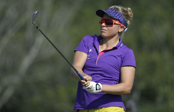 Fabienne In-Albon of Switzerland, watches her tee shot on the 4th hole during the first round of the women&#039;s golf event at the 2016 Summer Olympics in Rio de Janeiro, Brazil, Wednesday, Aug. 17,  ...