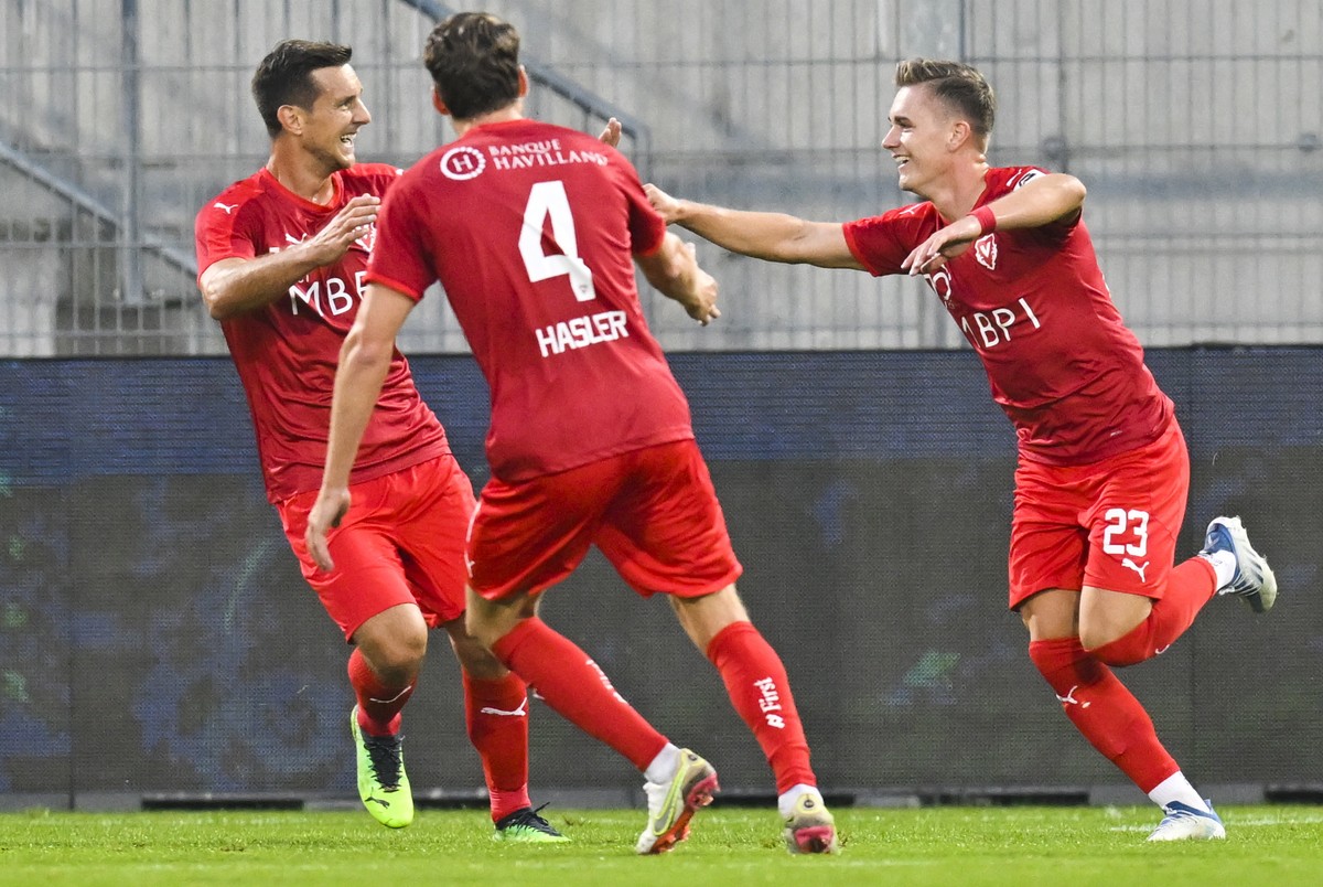 epa10127894 Vaduz' Dario Ulrich (R) celebrates after scoring the 1-0 during the UEFA Conference League Playoff first leg soccer game between Liechtenstein's FC Vaduz and Austria's Rapid ...