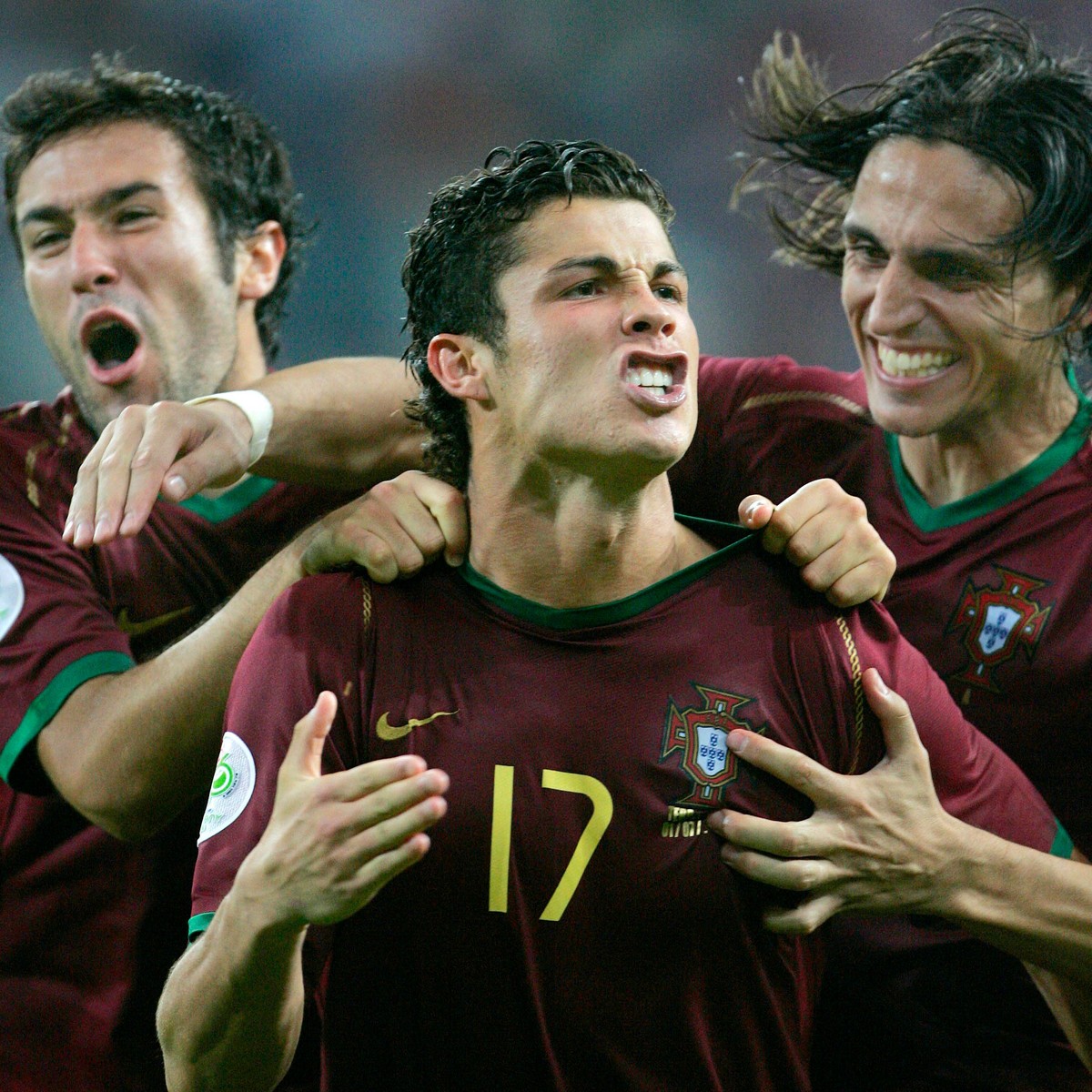 FILE - Portugal's Cristiano Ronaldo celebrates with teammates after scoring the winning penalty kick in a shootout against England during the quarterfinal World Cup soccer match in Gelsenkirchen, ...