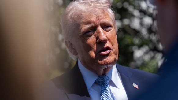 President Donald Trump speaks with reporters during the White House Easter Egg Roll on the South Lawn of the White House, Monday, April 6, 2026, in Washington. (AP Photo/Julia Demaree Nikhinson)
Trump