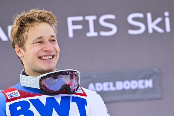 epa09673879 Winner Marco Odermatt of Switzerland celebrates on the podium after the men&#039;s giant slalom race at the Alpine Skiing FIS Ski World Cup in Adelboden, Switzerland, 08 January 2022. EPA/ ...
