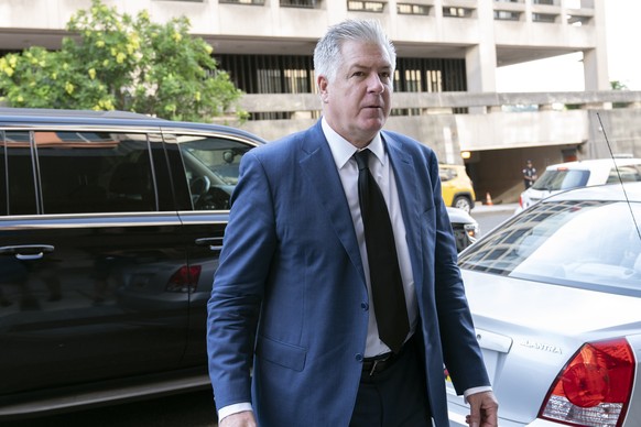 Attorney M. Evan Corcoran arrives at federal court in Washington, July 22, 2022. Justice Department prosecutors investigating the mishandling of classified documents at Donald Trump&#039;s Florida est ...