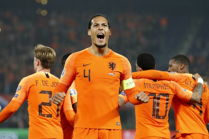 epa07454411 (L-R) Frenkie de Jong of Holland, Virgil van Dijk of Holland, Memphis Depay of Holland, Georginio Wijnaldum of Holland during the UEFA EURO 2020 qualifier group C qualifying match between  ...