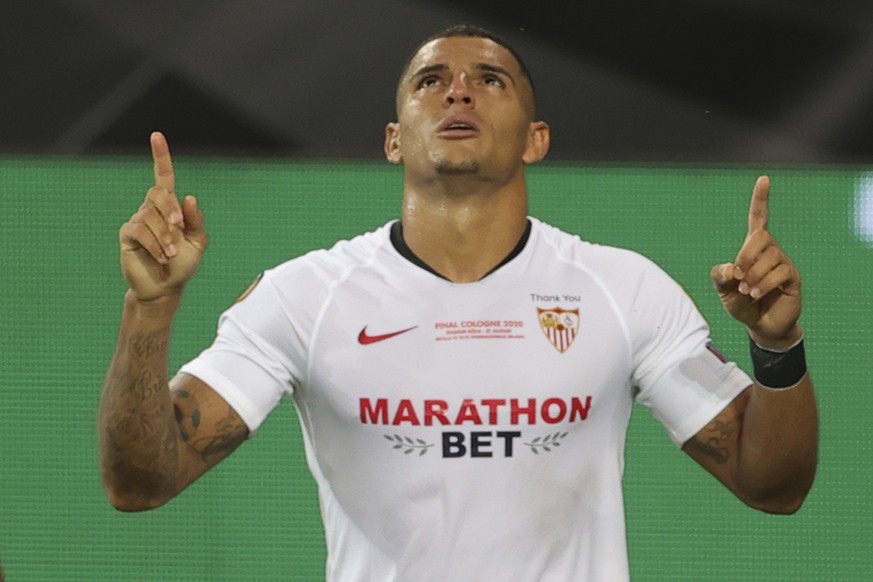 Sevilla&#039;s Diego Carlos celebrates after scoring his side&#039;s third goal during the Europa League final soccer match between Sevilla and Inter Milan in Cologne, Germany, Friday, Aug. 21, 2020.  ...