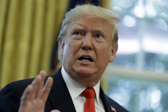 President Donald Trump speaks about Hurricane Dorian as he speaks to reporters in the Oval Office of the White House, Wednesday, Sept. 4, 2019, in Washington. (AP Photo/Evan Vucci)
Donald Trump