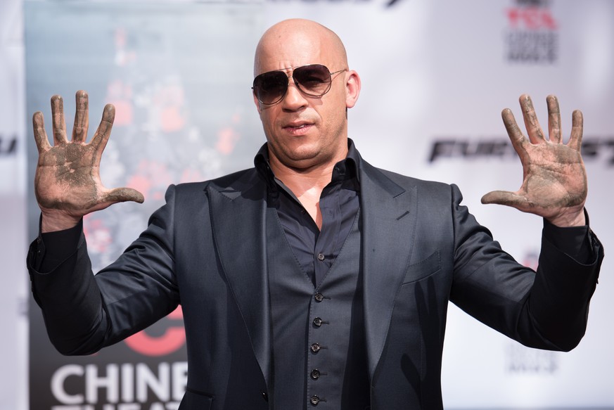 Vin Diesel poses for a photo during the Vin Diesel Hand and Footprint ceremony in the courtyard of the TCL Chinese Theatre on Wednesday, April 1, 2015, in Los Angeles. The actor stars in the new film, ...