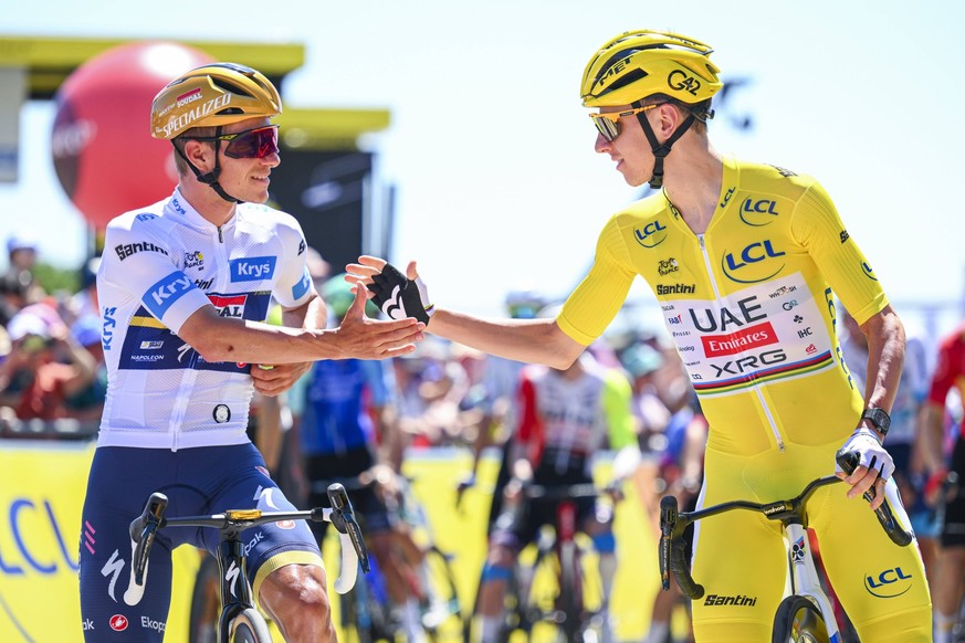 Tour de France 2025 Stage 8 LAVAL ESPACE MAYENNE, FRANCE - JULY 12 : Pogacar Tadej SLO of UAE Team Emirates - XRG, Evenepoel Remco BEL of Soudal - Quick Step at the start line during stage 8 of the 11 ...