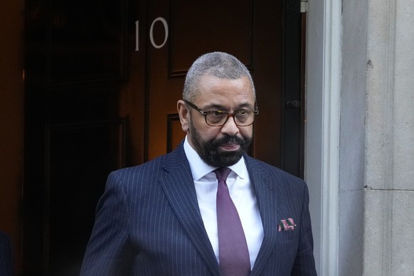 Britain&#039;s Home Secretary James Cleverly leaves 10 Downing Street after attending a cabinet meeting, in London, Tuesday, Nov. 28, 2023. A diplomatic spat erupted Monday between Greece and Britain  ...