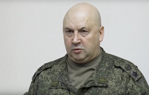 FILE - In this handout photo taken from video released by Russian Defense Ministry Press Service on Wednesday, Nov. 9, 2022, the top Russian military commander in Ukraine, Gen. Sergei Surovikin report ...
