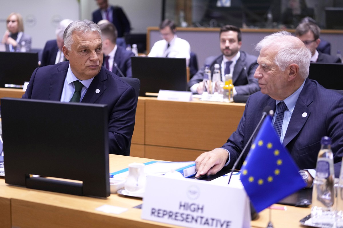 Hungary's Prime Minister Viktor Orban, left, speaks with European Union foreign policy chief Josep Borrell during an EU-Gulf Cooperation Council roundtable meeting at the European Council buildin ...