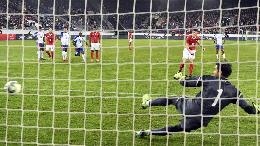 Switzerland&#039;s Granit Xhaka scores with penalty against Panama&#039;s Jaime Penedo the 2-0 for Switzerland X during the International Friendly soccer match between Switzerland and Panama in Lucern ...