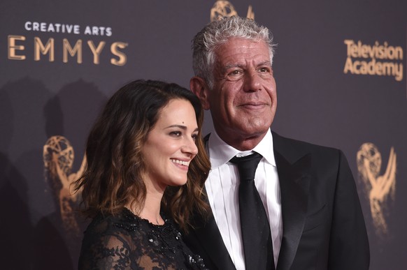 Asia Argento, left, and Anthony Bourdain arrives at night one of the Creative Arts Emmy Awards at the Microsoft Theater on Saturday, Sept. 9, 2017, in Los Angeles. (Photo by Richard Shotwell/Invision/ ...