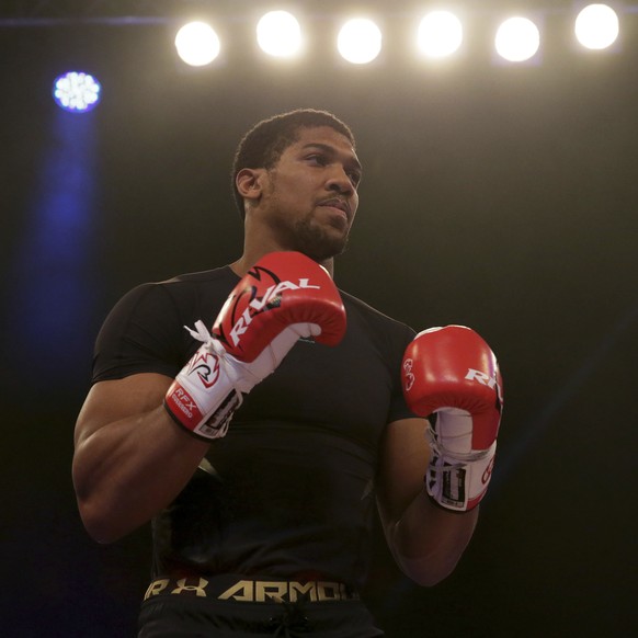 IBF heavyweight champion Anthony Joshua during a public training session at the Wembley Arena in London, Wednesday April 26, 2017. Anthony Joshua and Wladimir Klitschko will fight for the IBF title in ...