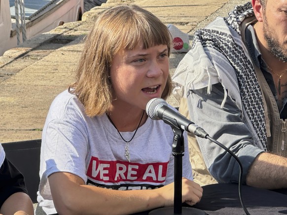 Swedish climate activist Greta Thunberg speaks during a news conference ahead of the launch of a civilian flotilla bound for Gaza, aiming to break the Israeli blockade and deliver humanitarian aid in  ...
