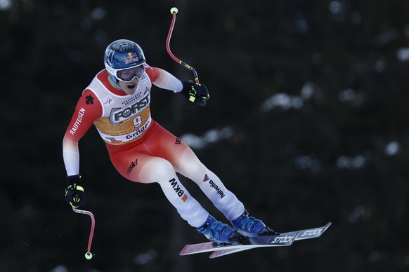 Switzerland&#039;s Marco Odermatt speeds down the course during an alpine ski, men&#039;s World Cup downhill race, in Val Gardena, Italy, Saturday, Dec. 16, 2023. (AP Photo/Gabriele Facciotti)