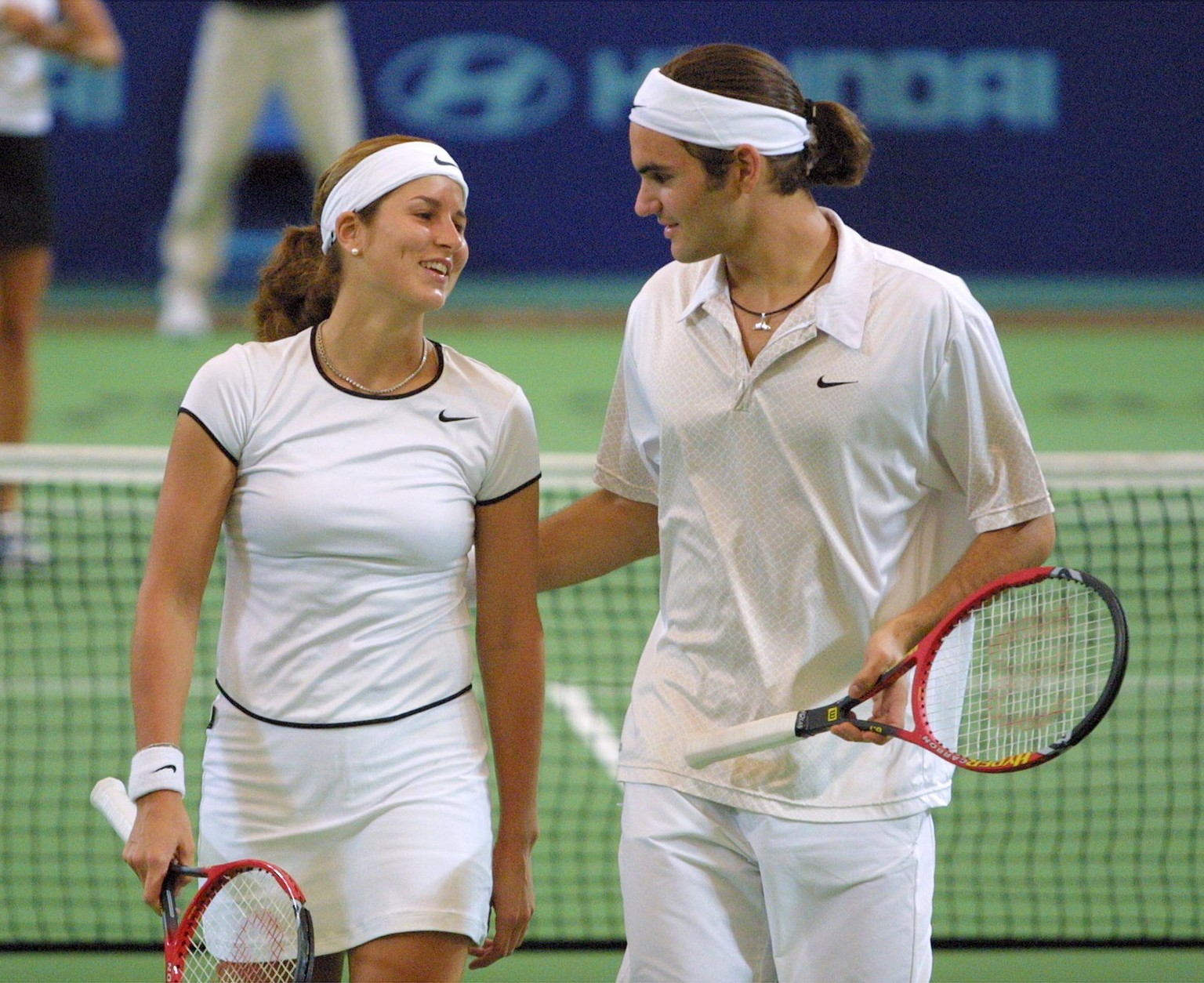 Roger Federer (re.) und Miroslava Vavrinec (beide Schweiz)

Roger Federer right and Miroslava Vavrinec both Switzerland