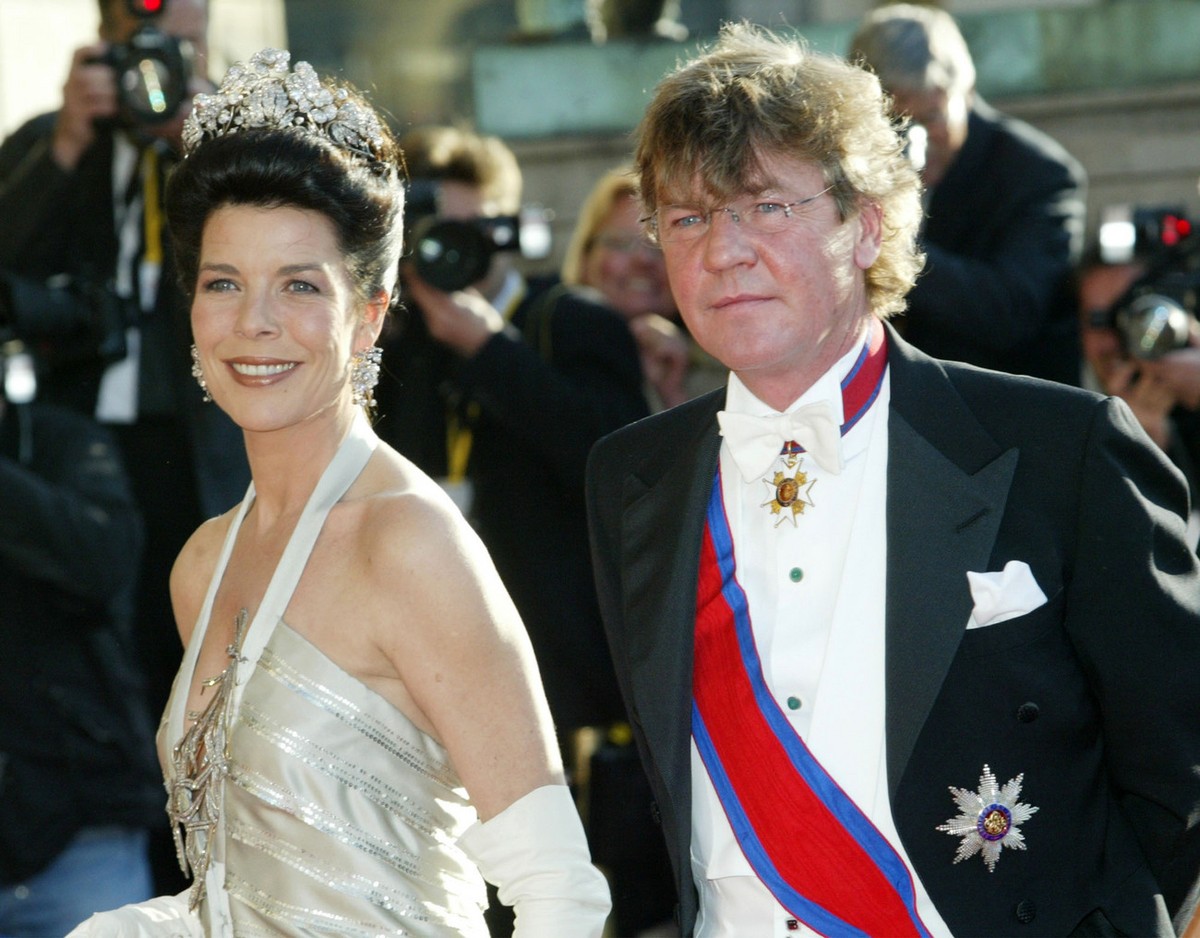 Monaco's Princess Caroline and Prince Ernst August of Hannover pass press photographers on their way to the Royal Theater in Copenhagen on Thursday, May 13, 2004. On the eve of the marriage of De ...