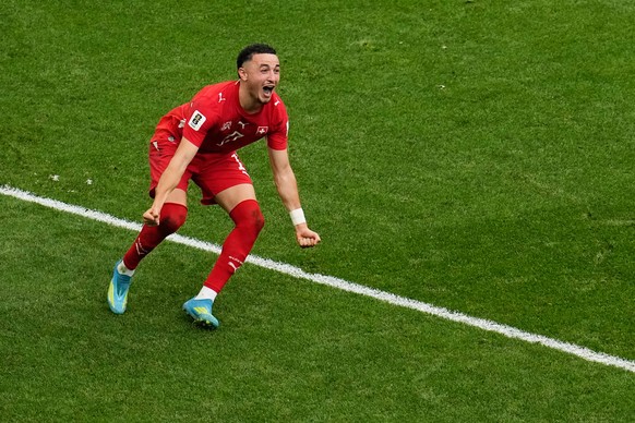 Switzerland's Ruben Vargas (17) celebrates after making the winning kick in a penalty shootout during the World Cup round of 16 soccer match between Switzerland and Colombia in Vancouver, British ...