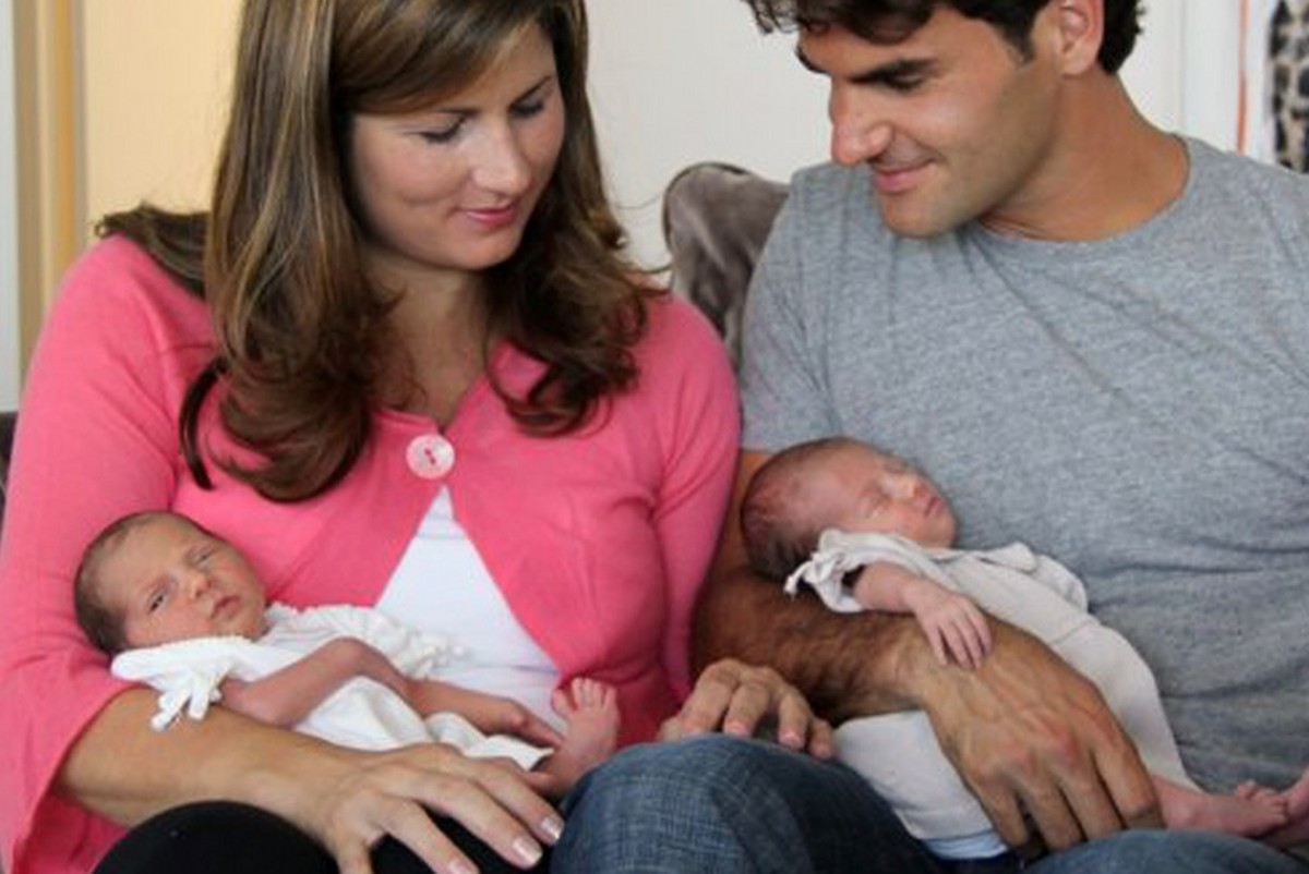 This undated photo taken by Robert Federer and posted on the Facebook fan site of his son, tennis' top-ranked player Roger Federer Friday, Aug. 7, 2009 shows Roger Federer, right, and his wife Mi ...