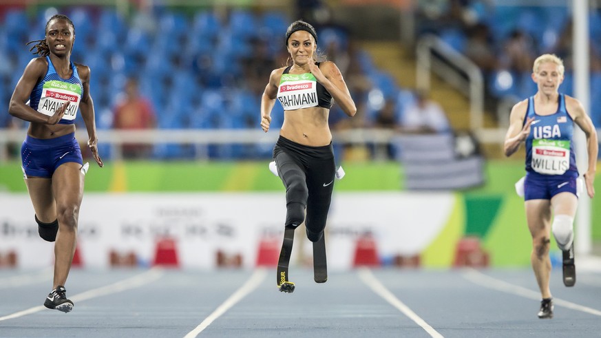 USA&#039;s Femita Ayanebeku, Switzerland&#039;s Abassia Rahmani and USA&#039;s Liz Willis, from left, during the women&#039;s 200m T44 heat in the Olympic Stadium at the Summer Paralympics Rio 2016 in ...