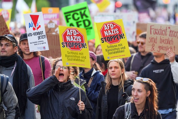 epa13085178 Demonstrators holding anti-AfD placards gather ahead of the Alternative for Germany (AfD) federal party congress in Erfurt, Germany, 04 July 2026. Thousands of counter-protesters are expec ...