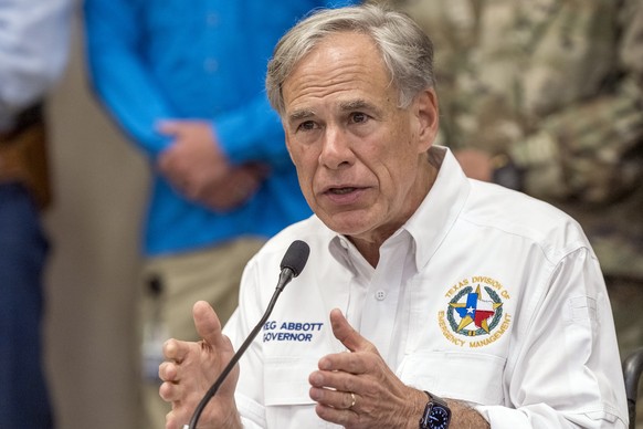 Texas Gov. Greg Abbott discuss the ongoing search and rescue efforts after recent flooding along the Guadalupe River during a press conference on Saturday, July 5, 2025, in Kerrville, Texas. (AP Photo ...