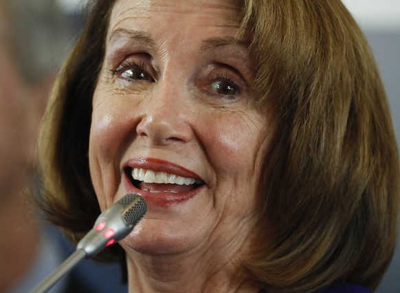 epa07380584 Democratic Speaker of the United States House of Representatives Nancy Pelosi addresses the media during a news conference after leading a high-level US Congressional delegation in partici ...
