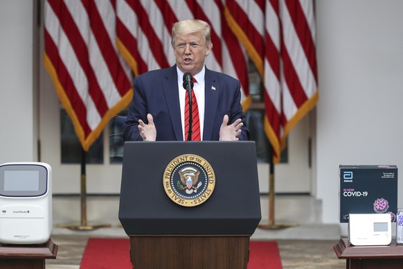 epa08415830 US President Donald J. Trump speaks during a press briefing on coronavirus testing in the Rose Garden of the White House in Washington, DC, USA, 11 May 2020. EPA/Oliver Contreras / POOL