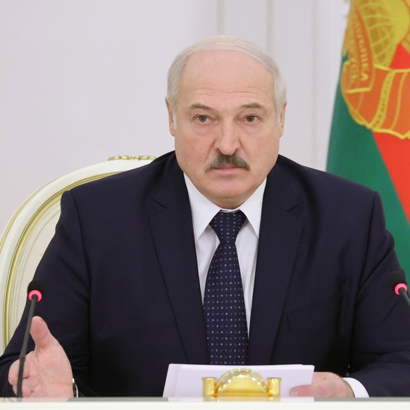 epa08868590 Belarusian President Alexander Lukashenko talks during a meeting for economy assessment for 2020 and a draft forecast documents for 2021 in Minsk, Belarus, 07 December 2020. EPA/MAXIM GUCH ...
