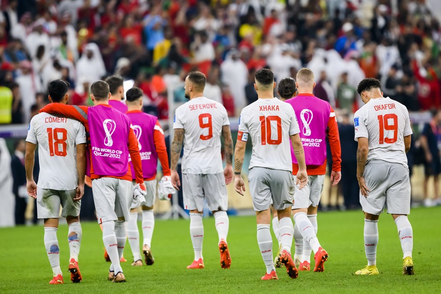 Switzerland&#039;s soccer players react after the elimination during the FIFA World Cup Qatar 2022 round of 16 soccer match between Portugal and Switzerland at the Lusail Stadium in Lusail, north of D ...