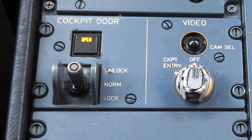A view of the door lock button in the cockpit of Airbus A321 operating Germanwings flight 4U9441, formerly 4U9525, from Barcelona to Dusseldorf March 27, 2015. The German pilot believed to have delibe ...