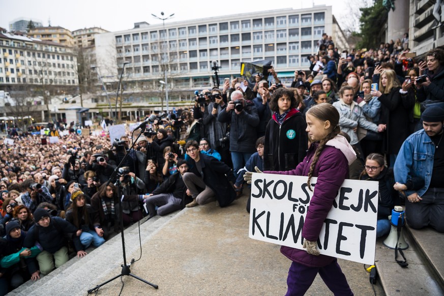 epa08135807 Swedish climate activist Greta Thunberg reacts to the crowd after an environmental Fridays for Future climate strike demonstration to protest a lack of climate awareness, in Lausanne, Swit ...