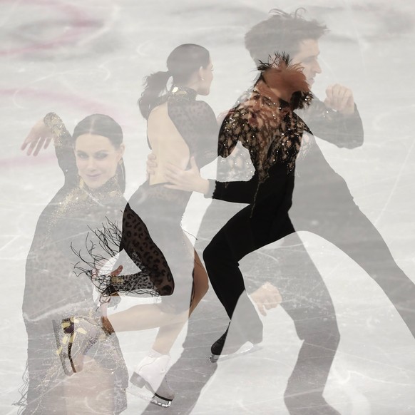 epa06541766 A multiple exposure image of Tessa Virtue and Scott Moir of Canada as they compete in the Ice Dance Short Dance of the Figure Skating competition at the Gangneung Ice Arena during the Pyeo ...