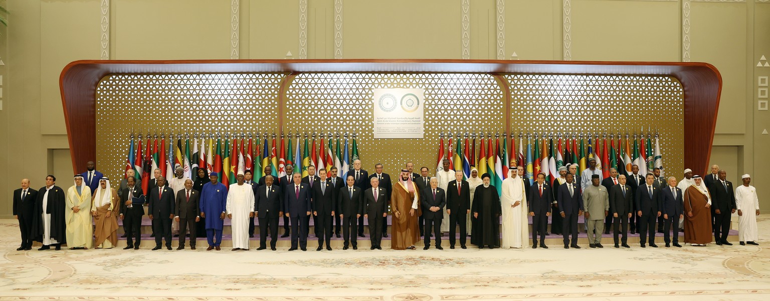 epa10969968 A handout photo made available by the Turkish Presidential press office shows leaders posing for a picture during the Organisation of Islamic Cooperation (OIC) leaders&#039; summit on Pale ...