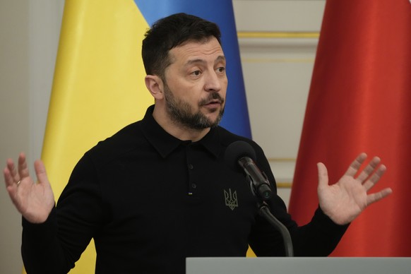 Ukrainian President Volodymyr Zelenskyy speaks during a joint news conference after talks with his Polish counterpart Andrzej Duda in Warsaw, Poland, on Wednesday, Jan. 15, 2025. (AP Photo/Czarek Soko ...