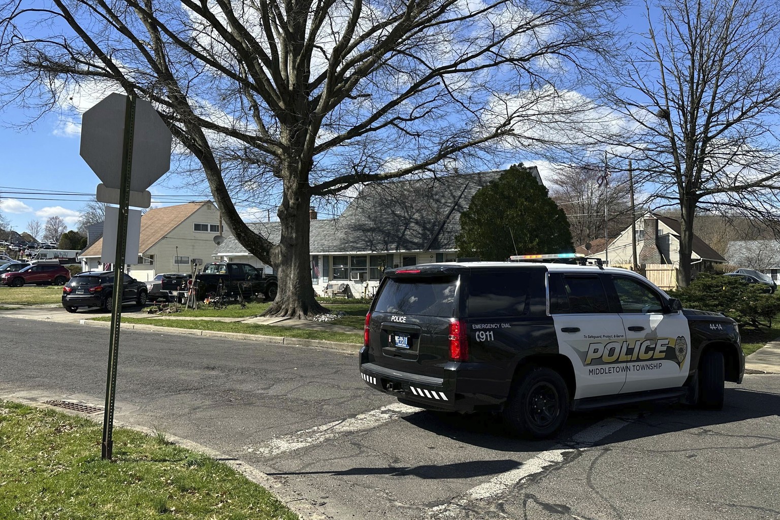 Police patrol a neighborhood after a shooting on Saturday, March 16, 2024, in Falls Township, Pennsylvania.  Several people have been shot after gunfire erupted in a Philadelphia suburb, sparking...