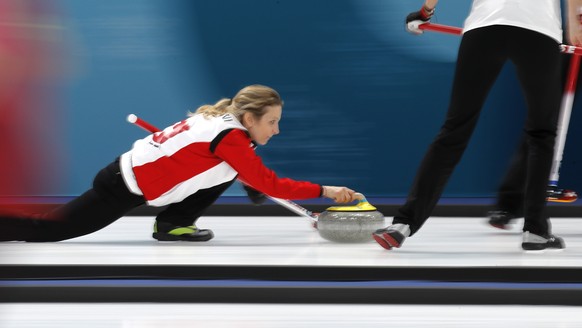 Switzerland&#039;s skip Silvana Tirinzoni prepares to launch the stone during their women&#039;s curling match against Britain at the 2018 Winter Olympics in Gangneung, South Korea, Monday, Feb. 19, 2 ...