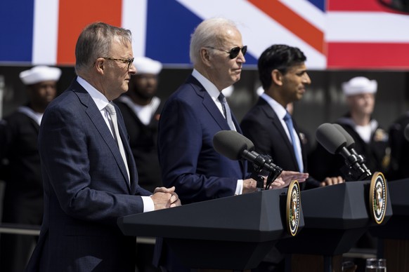 epa10521442 (L-R) Australian Prime Minister Anthony Albanese, US President Joe Biden and British Prime Minister Rishi Sunak hold a press conference at Point Miramar naval base in San Diego,…