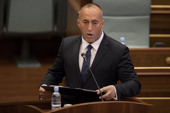 epa06194900 Leader of the Alliance for Future of Kosovo (AAK), Ramush Haradinaj, holds a speech during the parliamentary session to elect the new Prime Minister of the Republic of Kosovo in Pristina,  ...