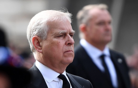epa10193533 Britain&#039;s Prince Andrew, the Duke of York, follows the coffin of his mother Queen Elizabeth II along Whitehall following her funeral at Westminster Abbey in London, Britain, 19 Septem ...