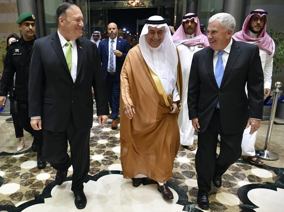 Secretary of State Mike Pompeo, left, walks with U.S. ambassador to Saudi Arabia John Abizaid, right, after arriving at King Abdulaziz International Airport in Jeddah, Saudi Arabia, Wednesday, Sept. 1 ...