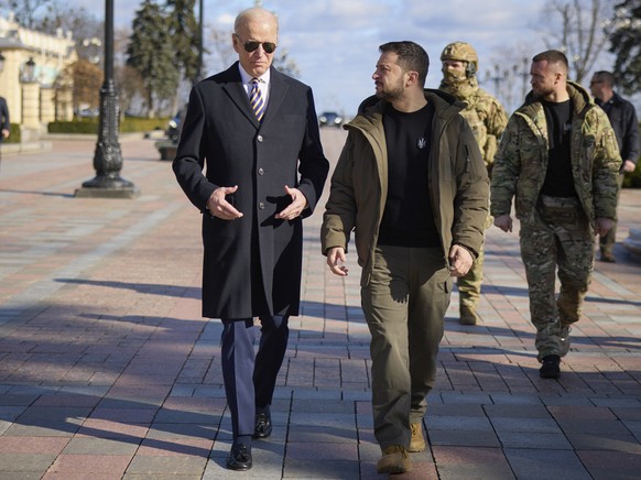 U.S. President Joe Biden, left, and Ukrainian President Volodymyr Zelenskyy walk during an unannounced visit in Kyiv, Ukraine, Monday, Feb. 20, 2023. (Ukrainian Presidential News Agency via AP)